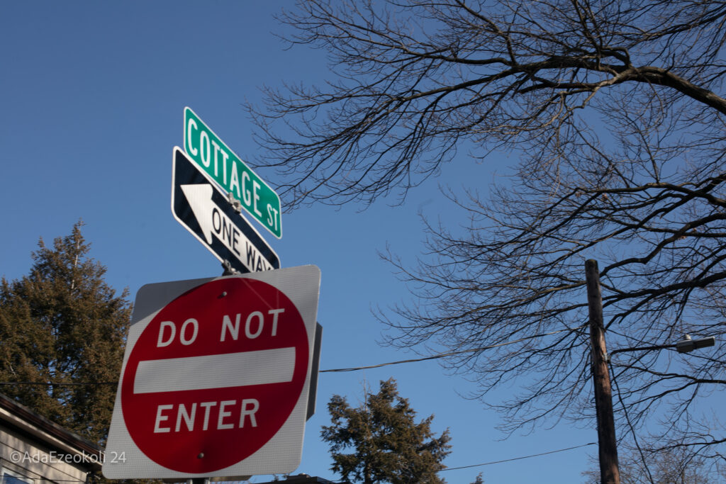 Street signage showing do not enter and one way