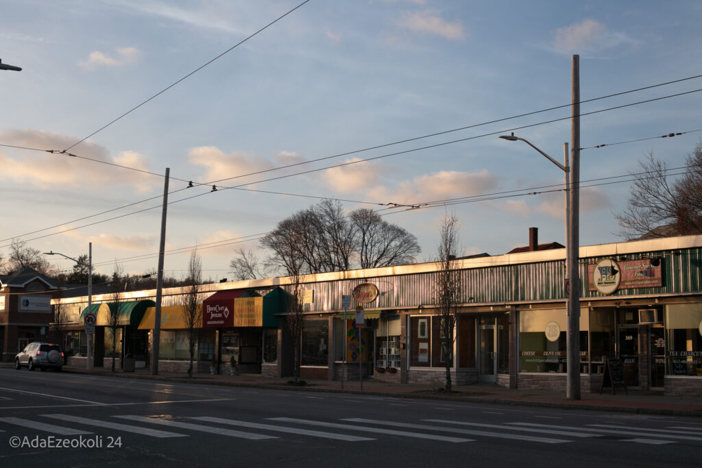 Sunset over a row of shops