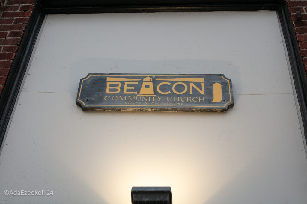 A church sign on a building