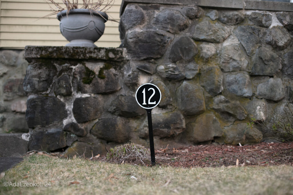 A yard signage that says 12