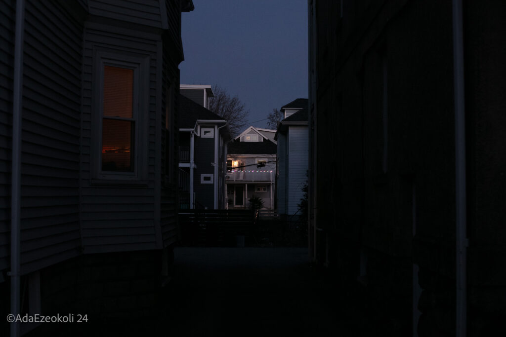 Houses framed by an alleyway