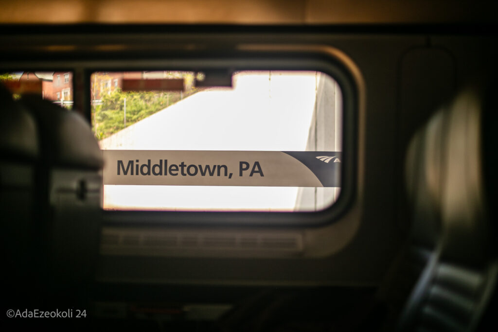 Signage for Middletown, PA framed by the train window